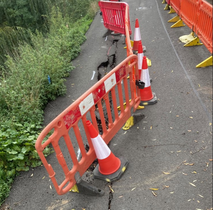 An image of a local road needing repair